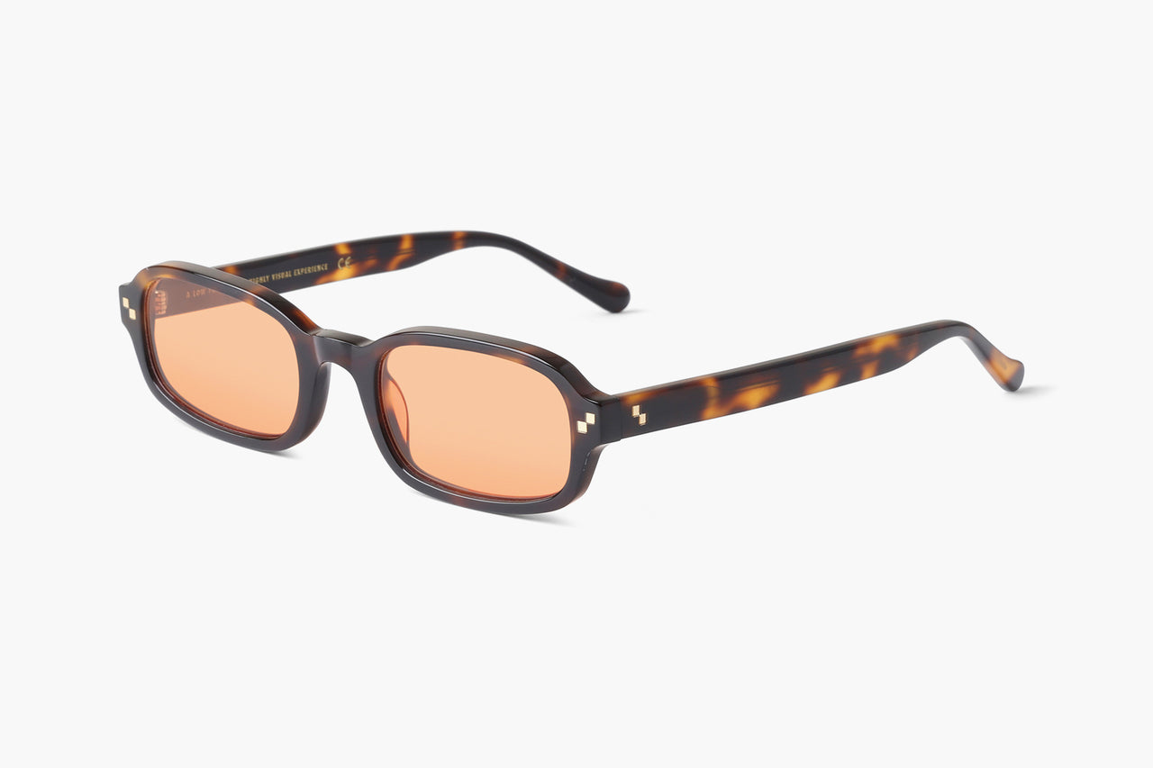 orange lens sunglasses sound bite sunglasses – a modern twist on 2000's nostalgia with vibrant y2k design elements. unisex, handcrafted cellulose acetate frame, and high-quality nylon lenses for uv protection.